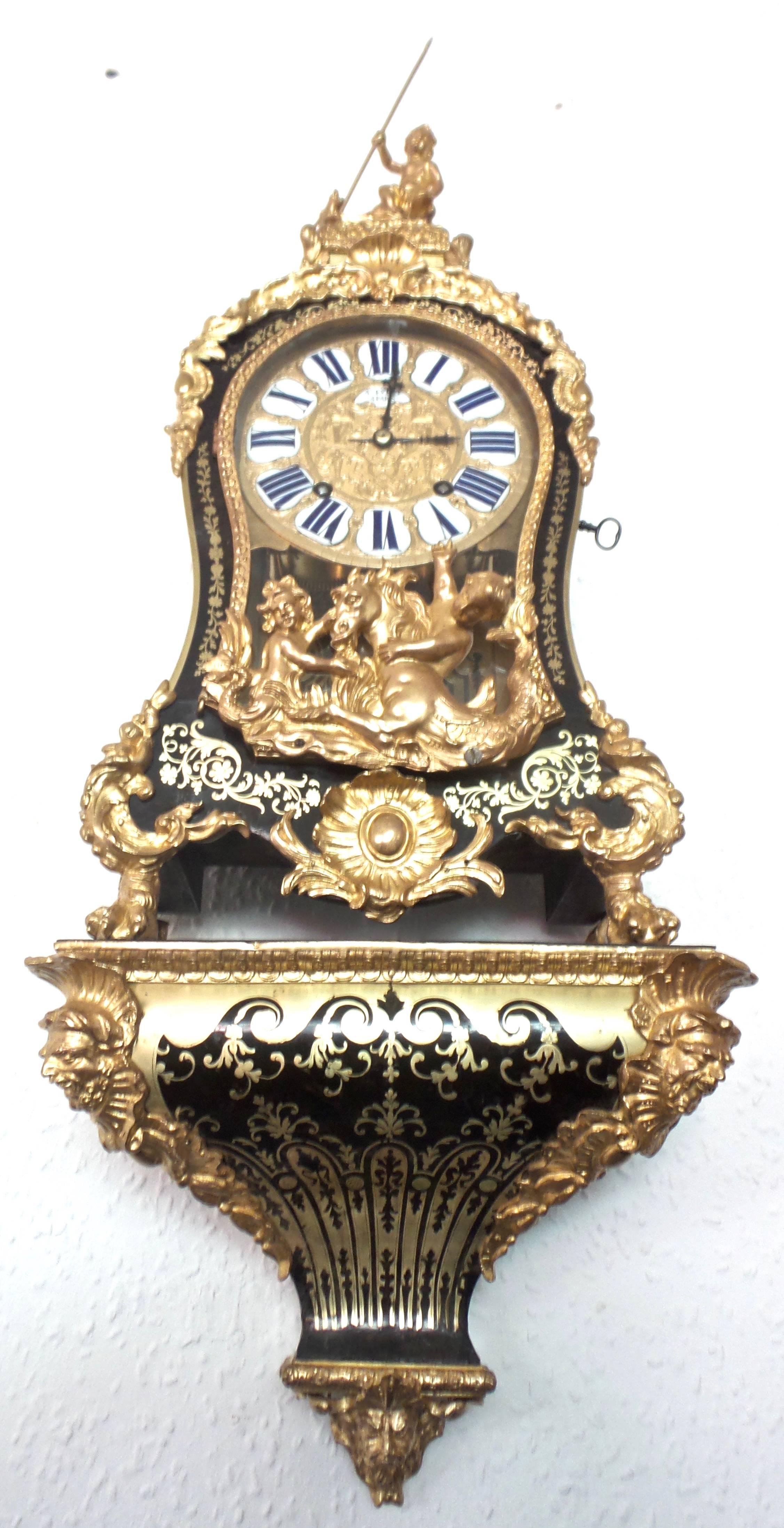 A very rare palace quality huge French antique 41” Boulle and gilt bronze bracket clock and bracket with names on the dial "Adre Furet, Paris"
An important clock with provenance. The clock coming from Chateau de la Seilleraye, Carquefou