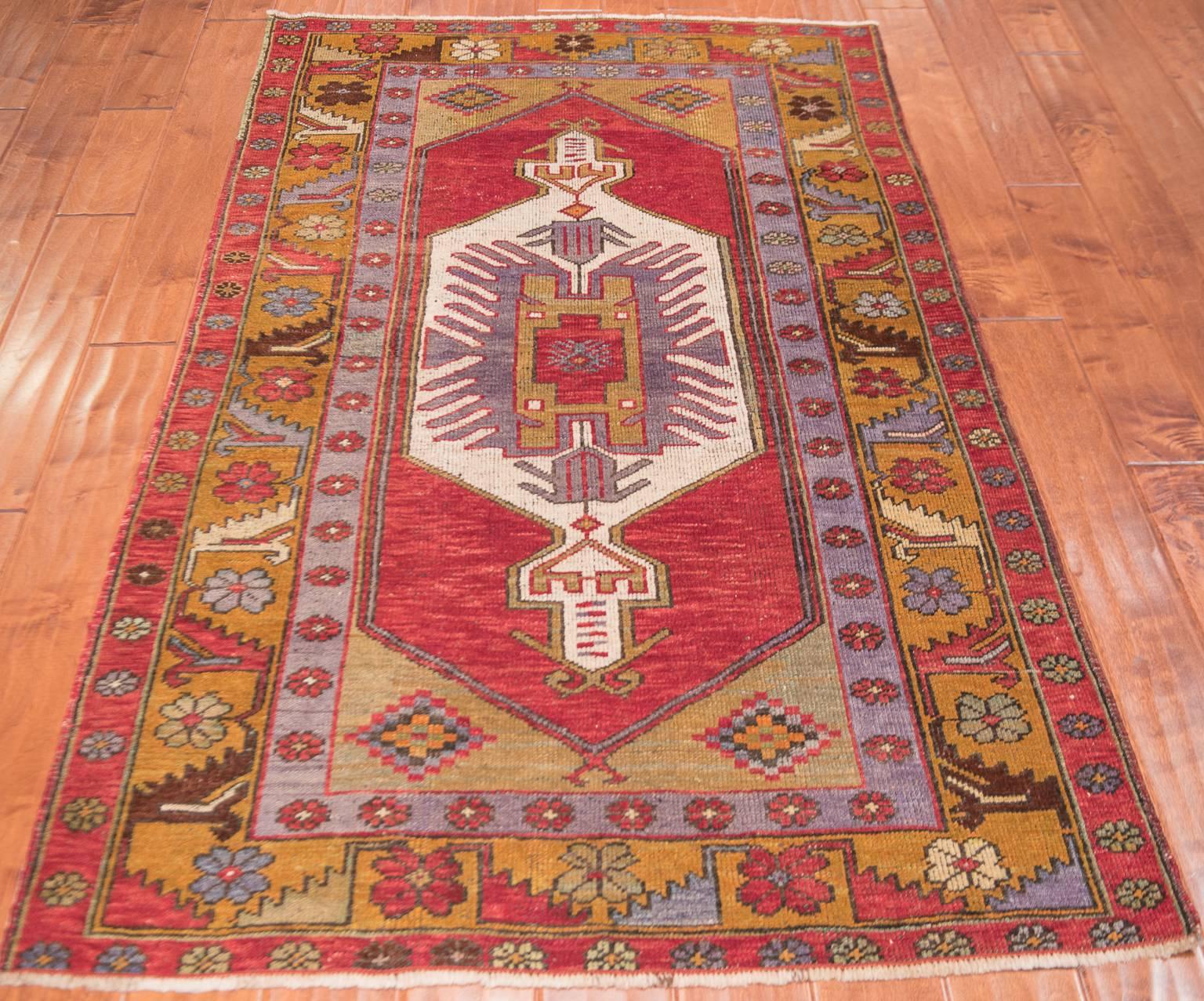 Vintage Anatolian Nigde rug.
Niğde is the market place for the surrounding area, and many rugs woven in the surrounding villages are sold under the trade name of Niğde. This rug is composed using the prayer niche design, meaning the niche and