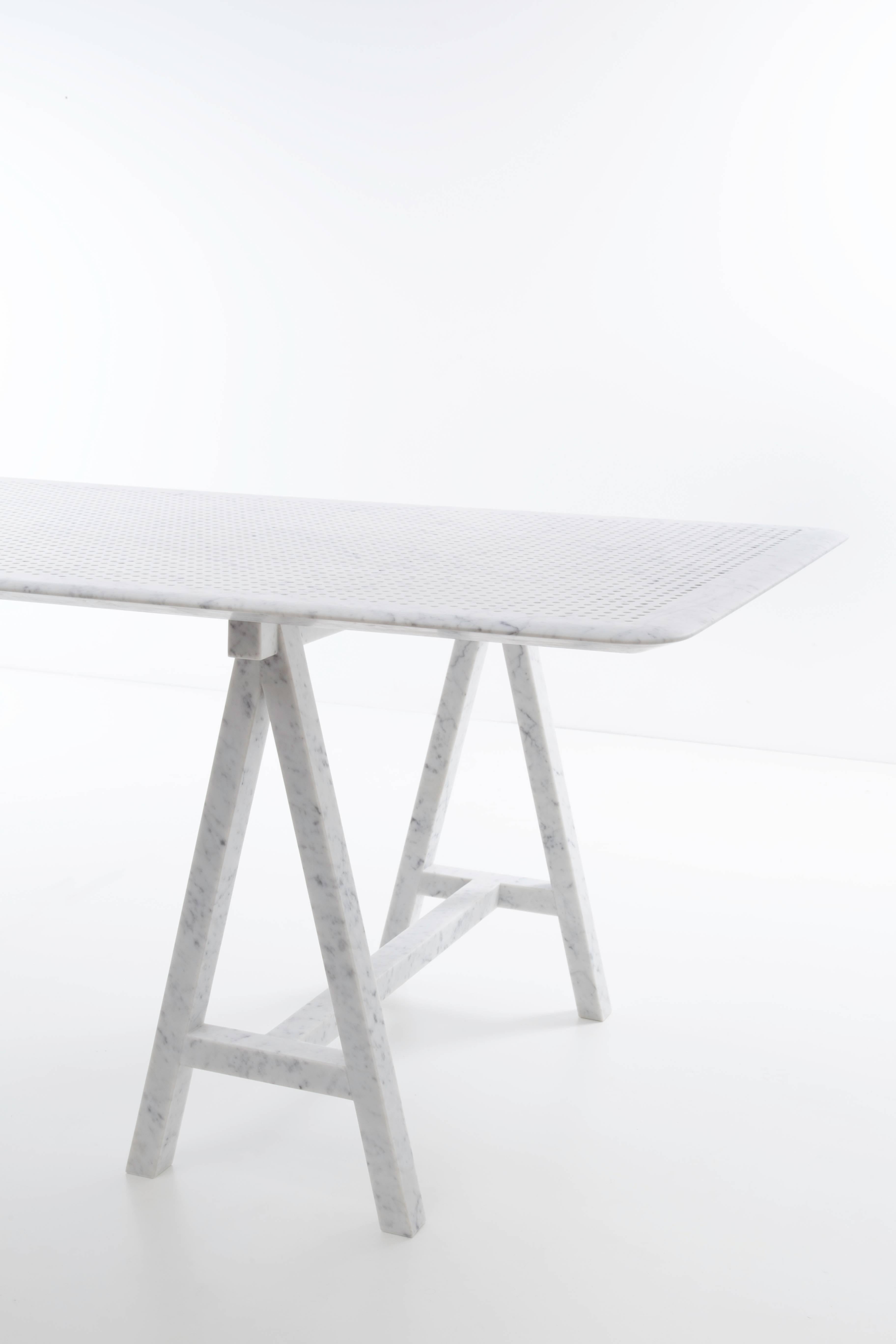 The project led by Normal Studio and Marbrerie d’Art Caudron is based on a research of greatness and lightness. This table consists of a plate in one piece: its dimensions were determined by the biggest size of a beautiful white Carrara marble slab,