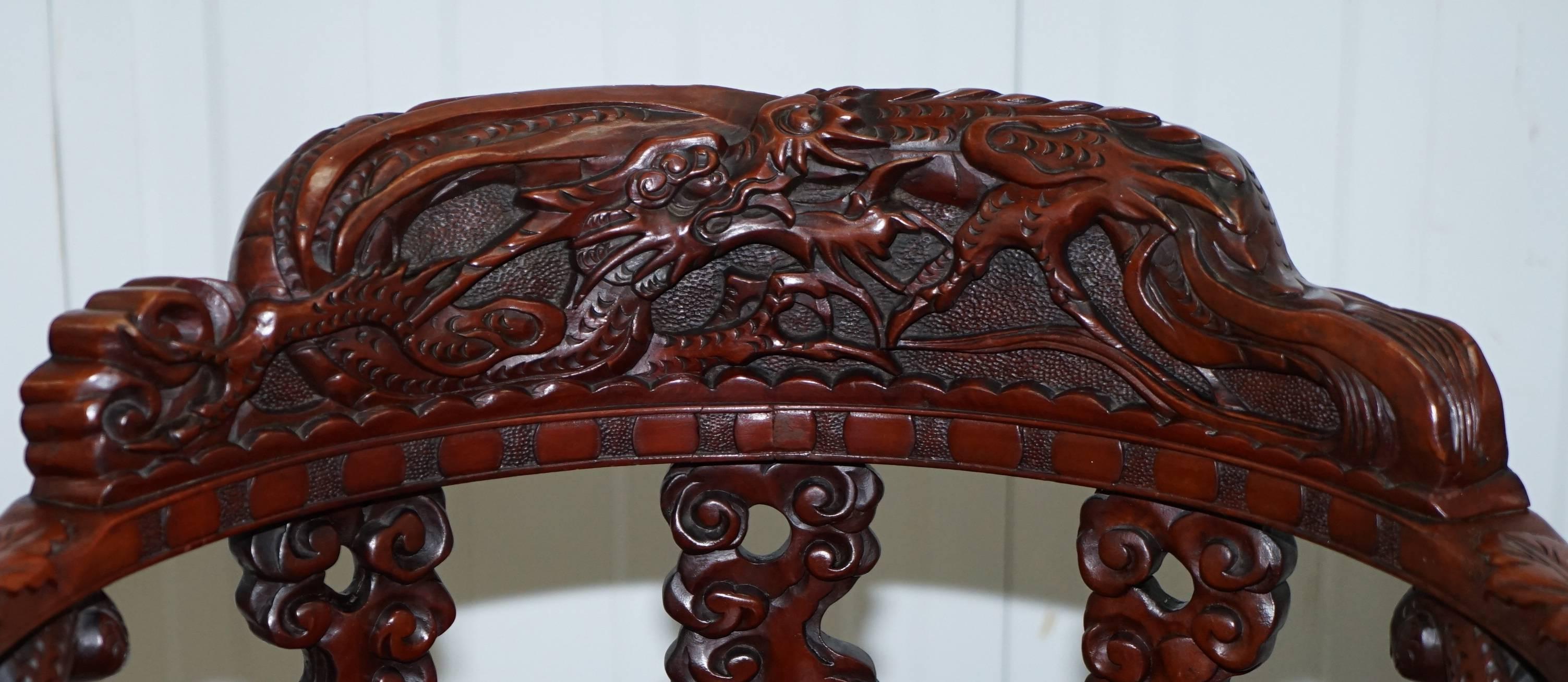 Wimbledon Furniture

We are delighted to offer for sale this stunning small rare model Qing dynasty, circa 1870 hand-carved solid rosewood dragon and lion foo dog throne armchair

Please note the delivery fee is just a guide, for an accurate