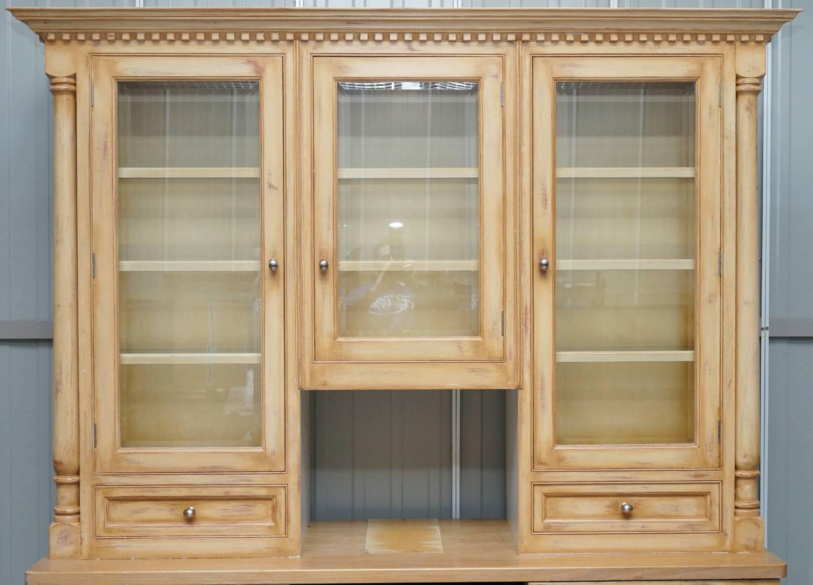 Antique & Vintage furniture Wimbledon 07850 890032

We are delighted to offer for sale this very rare panelled solid English vintage oak kitchen cupboard welsh dresser with built in wine cooler fridge

This piece is very large and substantial,