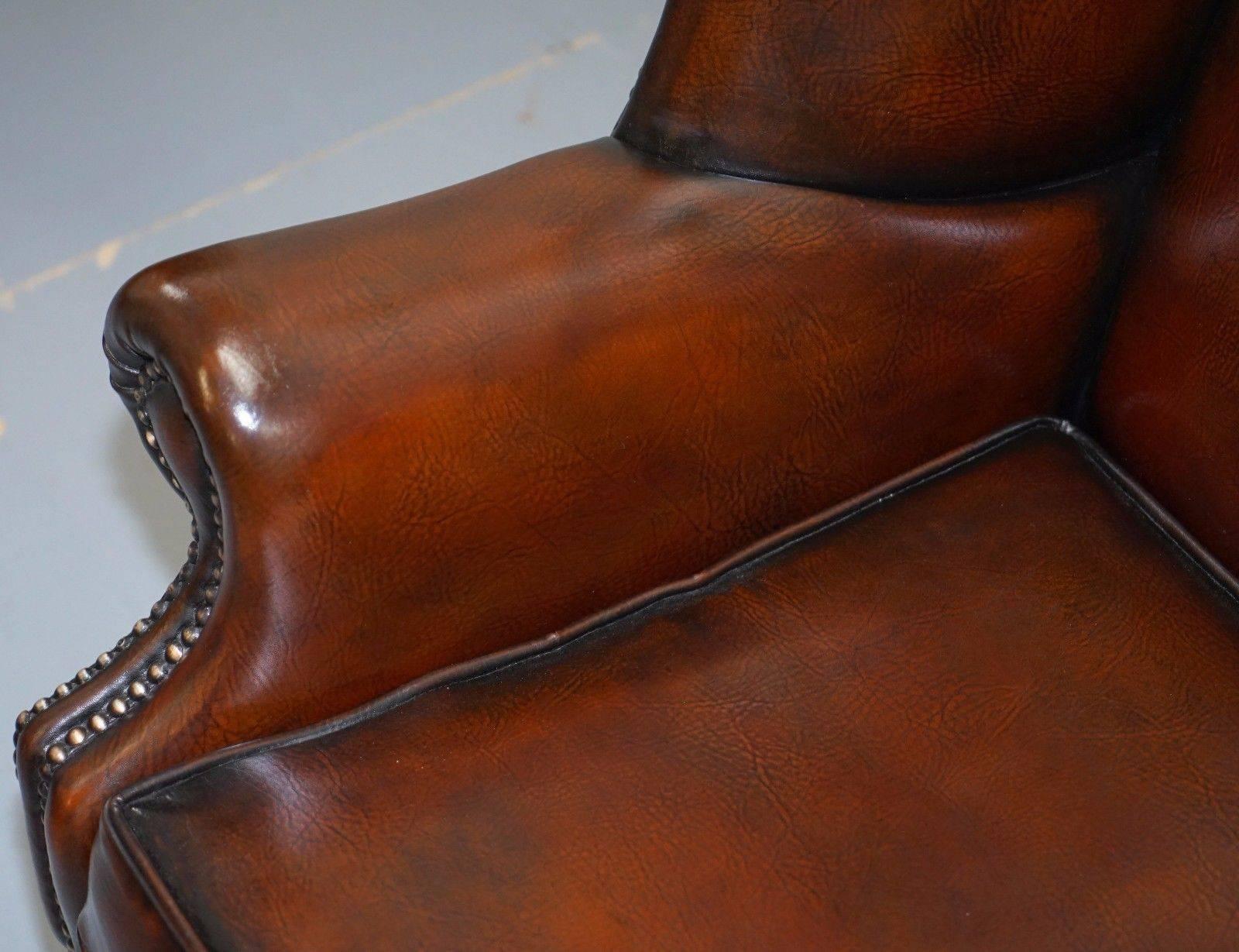 Hand-Crafted Pair of Restored Brown Leather Porters Wide Wingback Armchairs