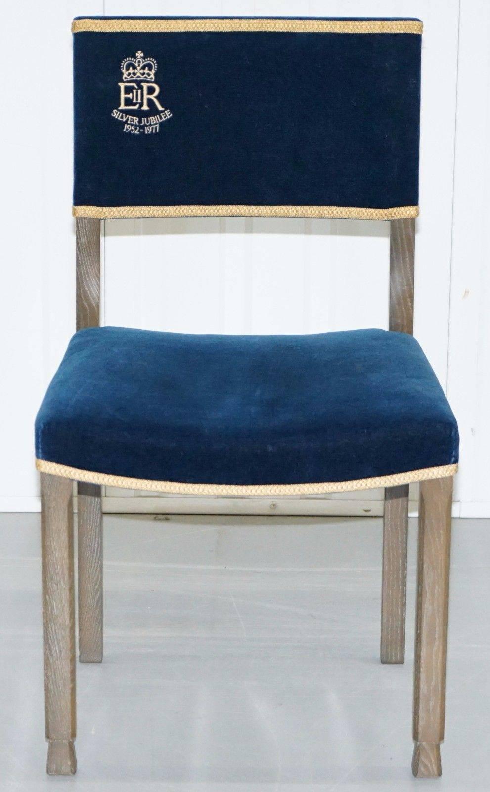 Nice and very rare original William Hands 1952-1977 Silver Jubilee anniversary edition Queen Elizabeth II Peers chair with Limed oak frame a premium royal blue velvet upholstery finished with gold threaded Queens crest

Please note the delivery fee