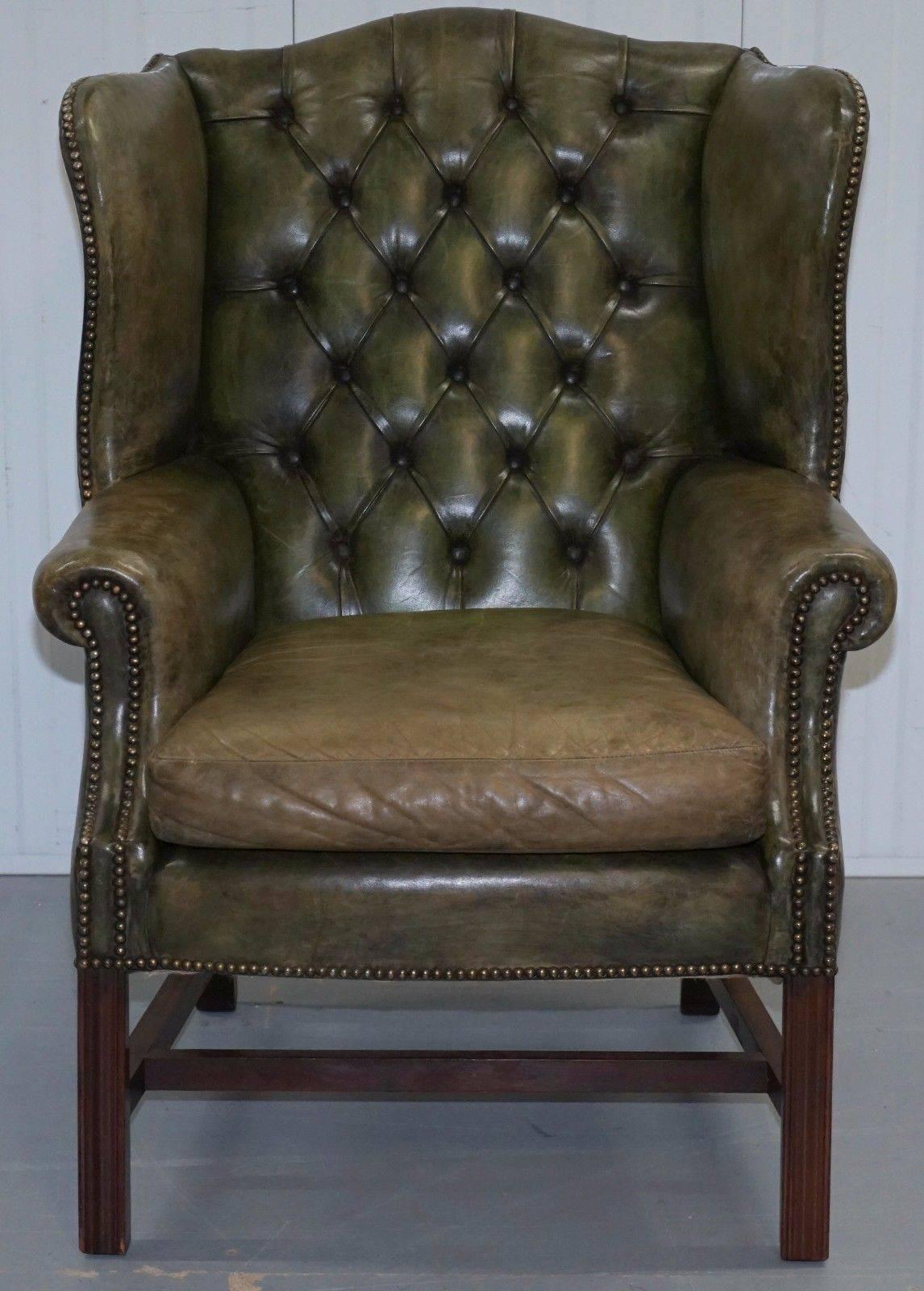 We are delighted to offer for sale this lovely original 1960s hand dyed green leather Chesterfield wingback armchair with George III straight H-frame legs

The condition is exactly what you should be looking for if you are in the market for an