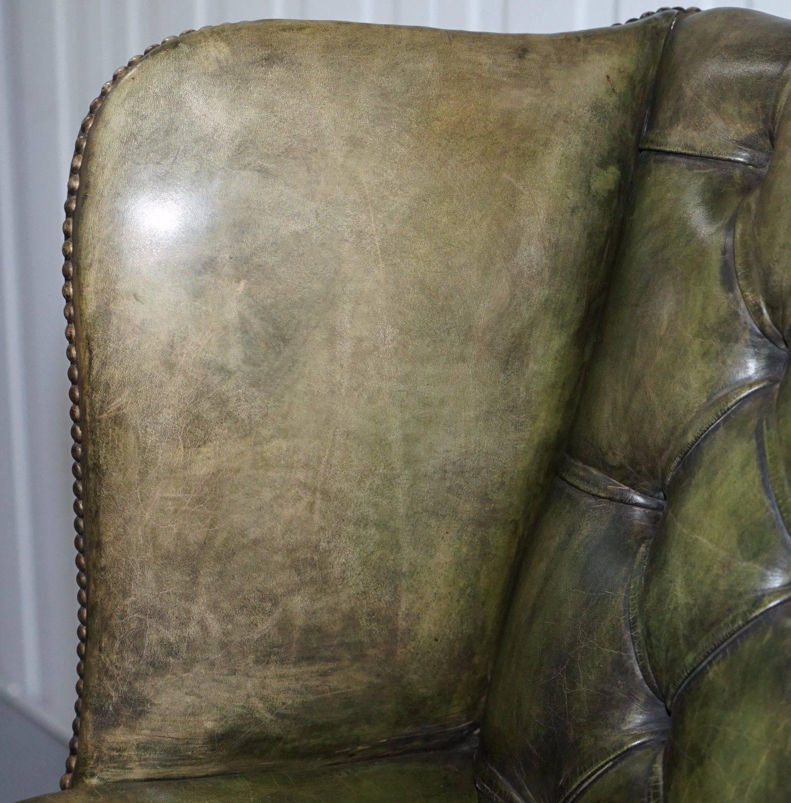 green leather wingback chair