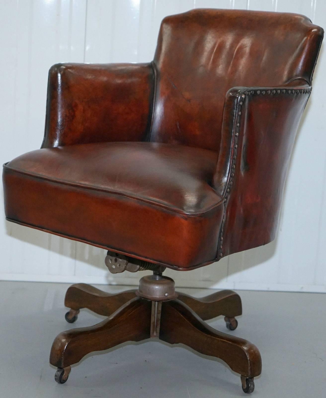 We are delighted to offer for sale this lovely fully restored Hillcrest original double tension spring 1920s horsehair padded with coil sprung base captains chair

This piece has been fully restored to include having the leather stripped back then