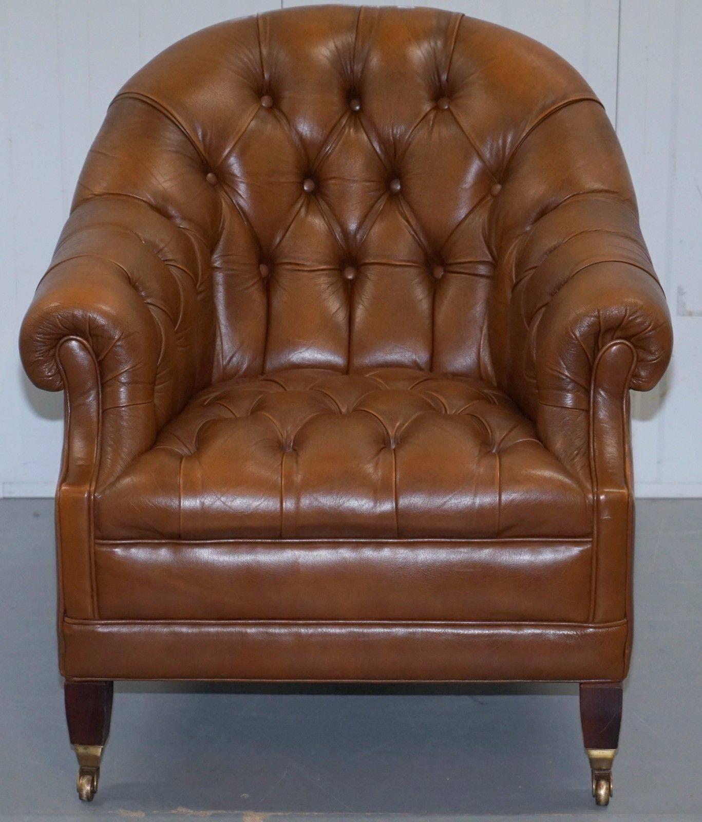 We are delighted to offer for sale this stunning aged brown leather Chesterfield club armchair with solid wood tapered legs and brass castors

A very nice well-made piece in vintage period condition, I had planned to have it hand dyed a lovely