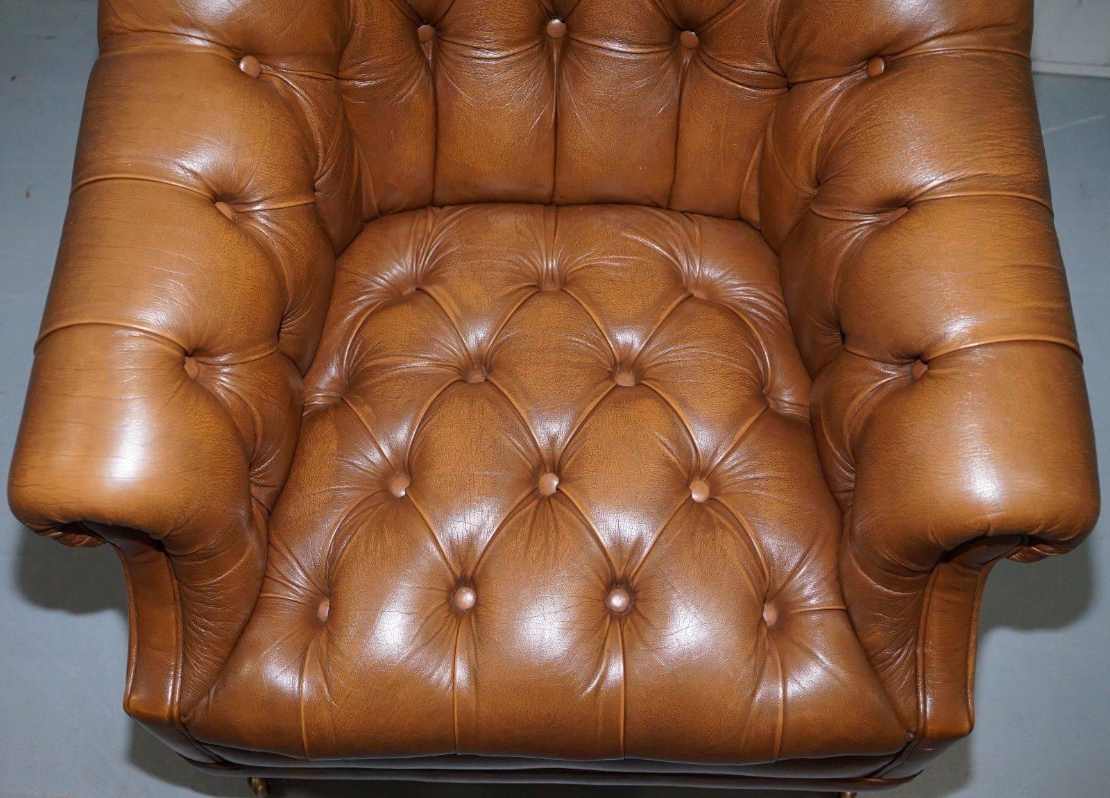 British Vintage Chesterfield Aged Brown Leather Club Armchair Beech Legs Brass Castors
