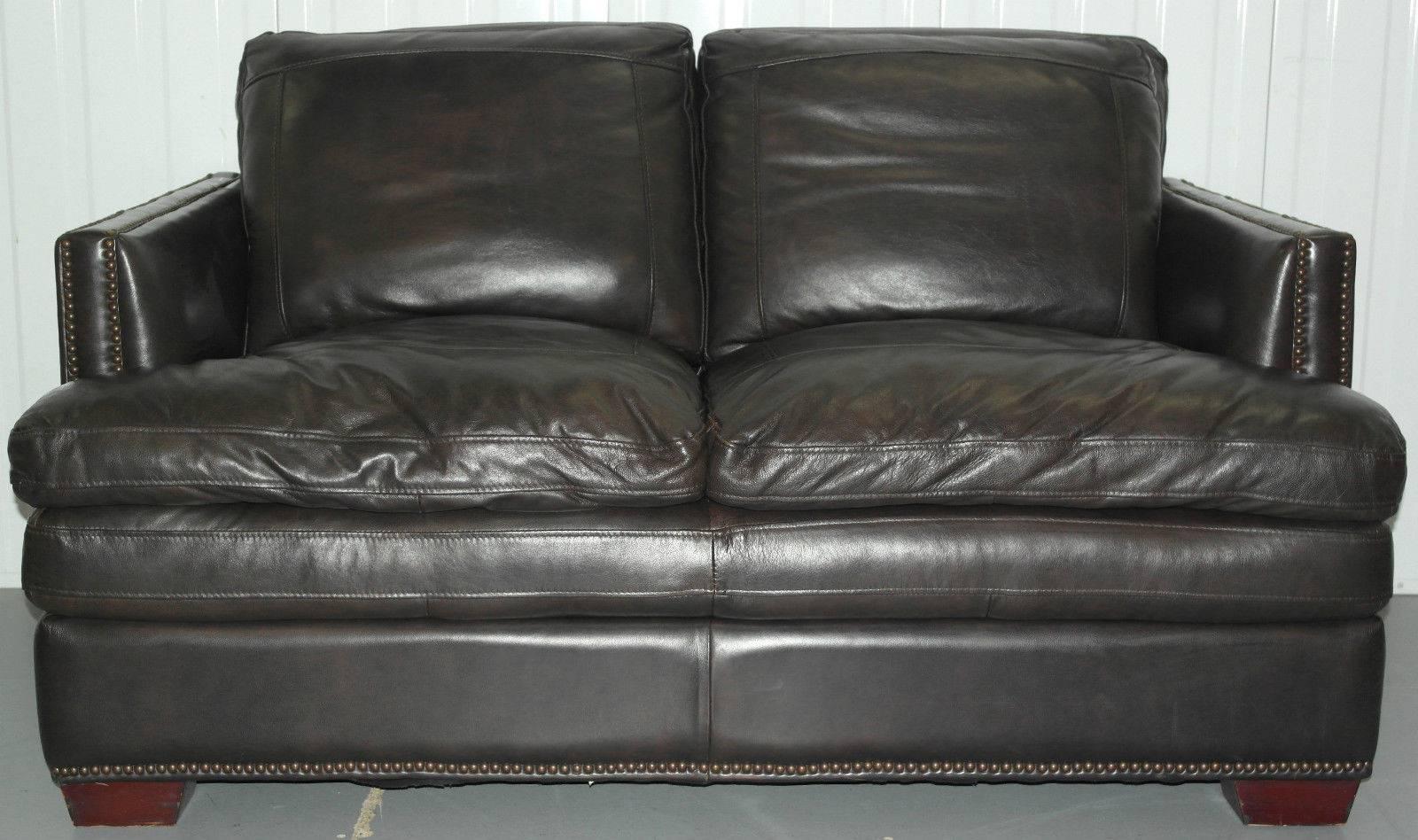 We are delighted to offer for sale this lovely extra comfortable double cushion brown leather studded club sofa

This is a real peach of a sofa, it's super comfortable, one of the best we’ve ever had come through the warehouse, its double