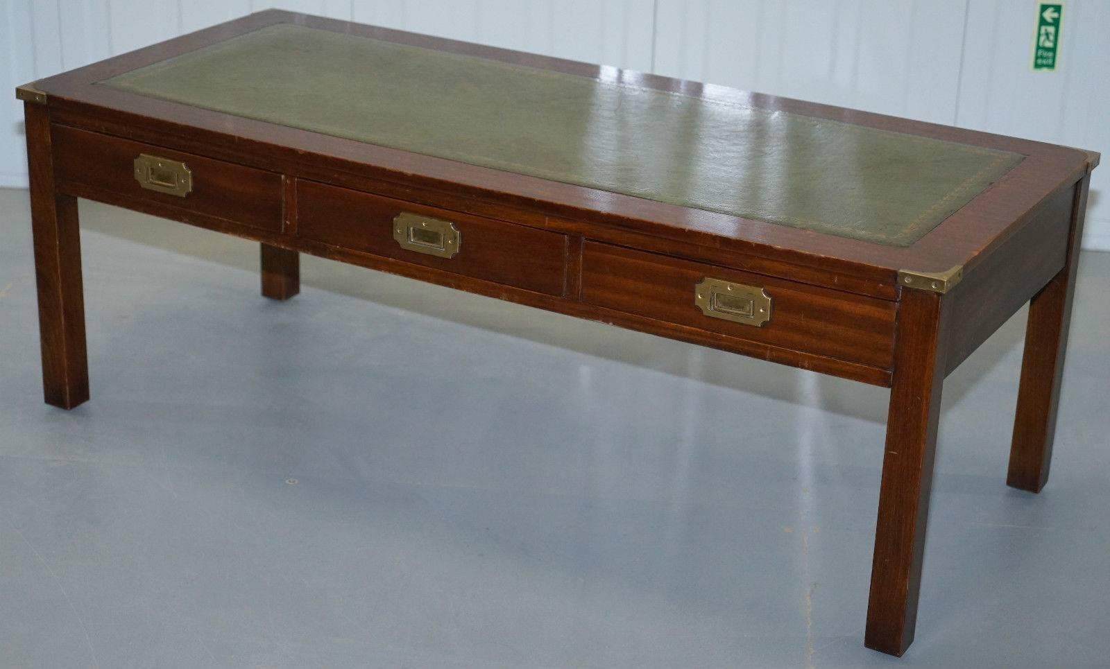 We are delighted to offer for sale this lovely military campaign coffee table with drawers and green leather surface RRP £1825

A rare find in lovely lightly restored condition, we have deep cleaned hand condition waxed and hand polished it from