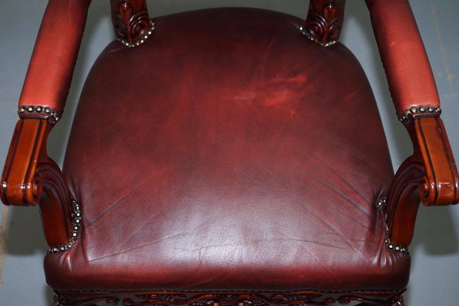 We are delighted to offer for auction this lovely pair of solid pine framed with oxblood leather Chesterfield oversized French Louis style carver armchairs

A really good looking and well-made pair, the upholstery is in tidy order throughout, the