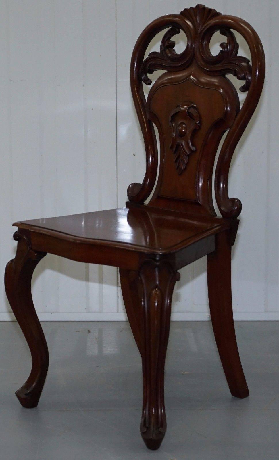 British Pair of Rare 1870 Victorian Hand-Carved Shield Backed Solid Mahogany Hall Chairs