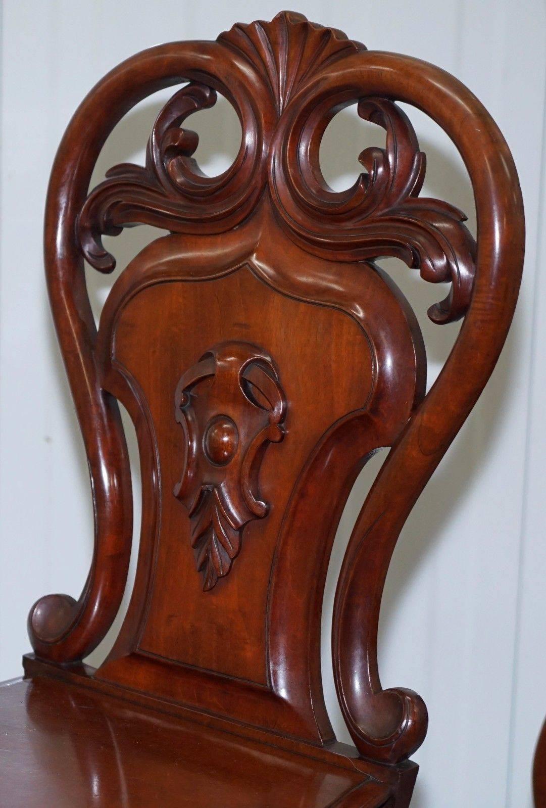 19th Century Pair of Rare 1870 Victorian Hand-Carved Shield Backed Solid Mahogany Hall Chairs