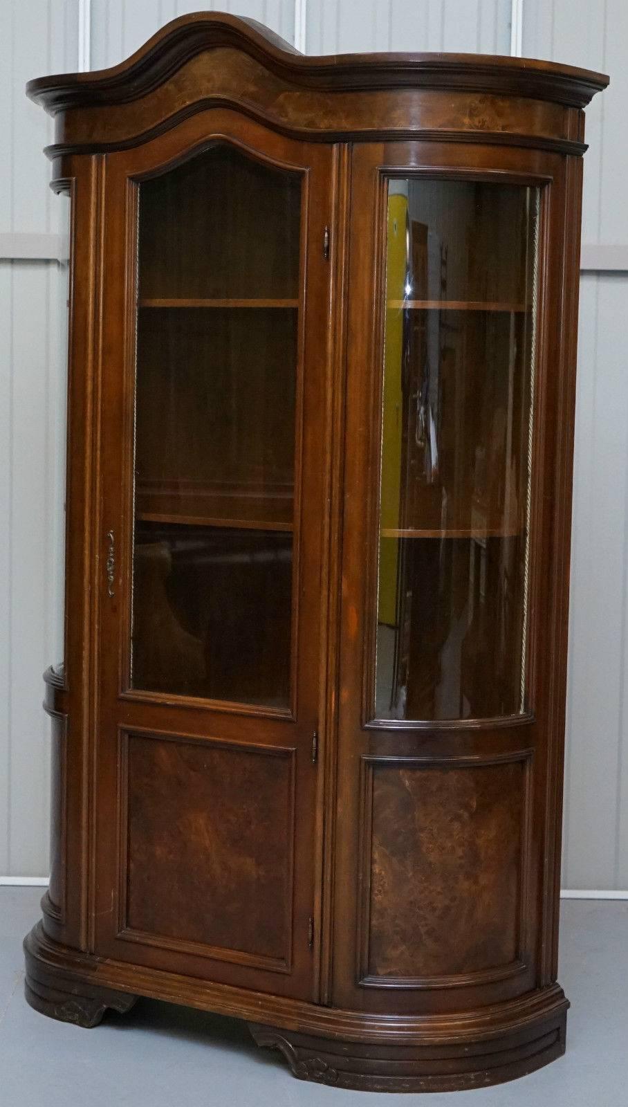 20th Century English Regency Style Walnut and Mahogany Bow Fronted Display Cabinet Bookcase