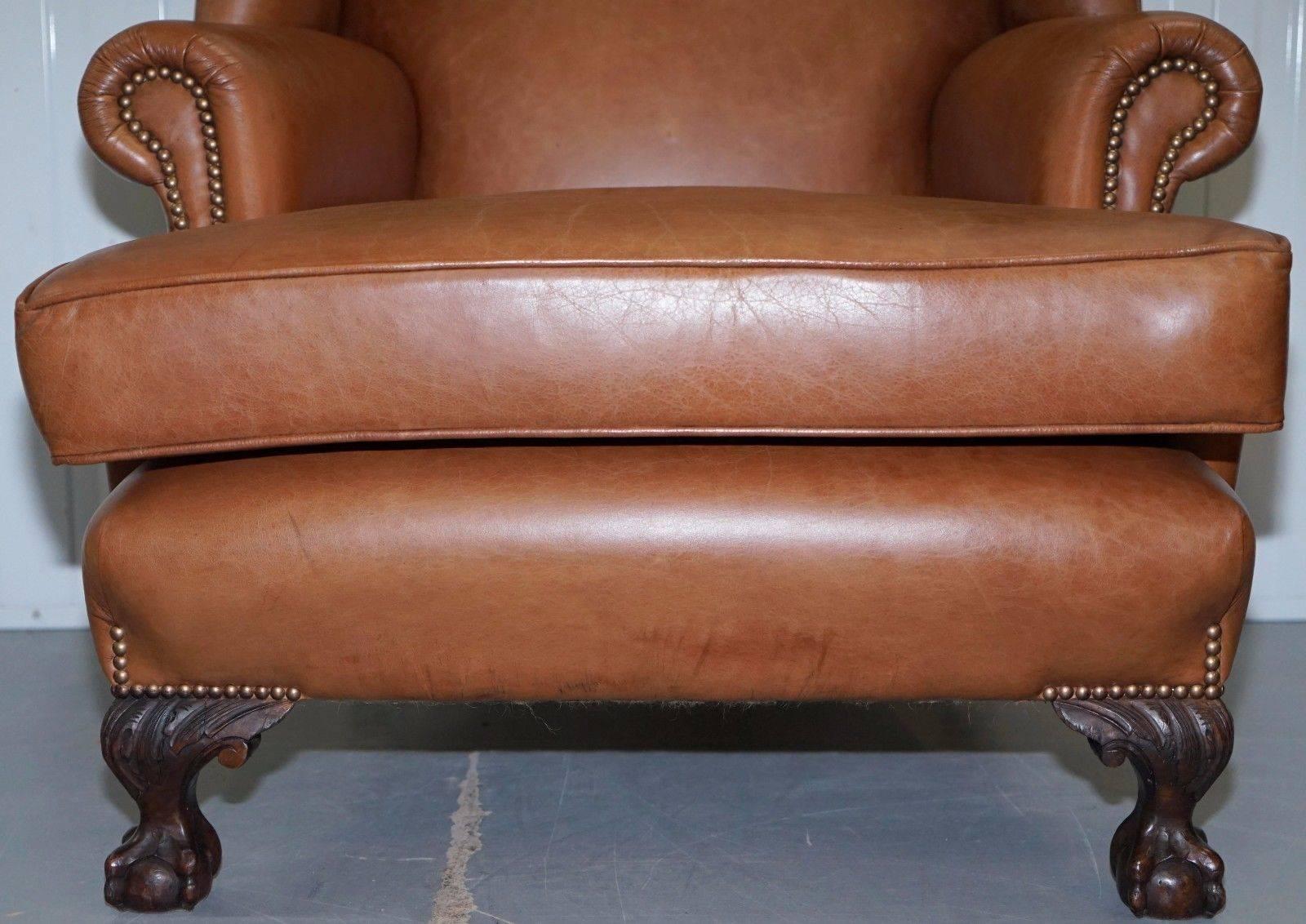 Hand-Carved Pair of Restored Brown Leather circa 1860 Wingback Armchairs Claw and Ball Feet For Sale