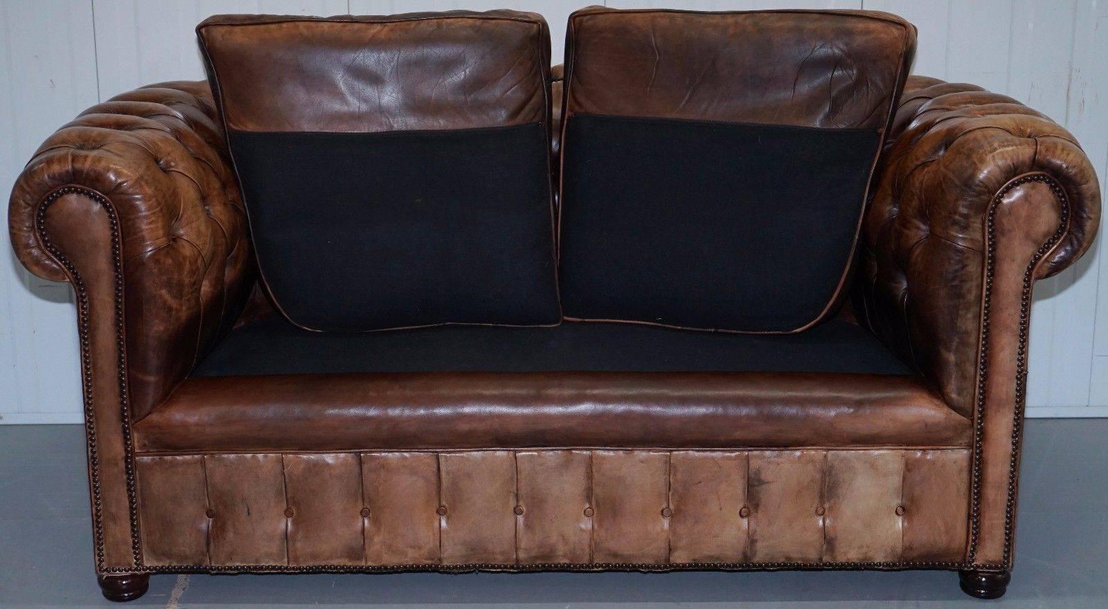 Wimbledon-Furniture is delighted to offer for sale this very rare model absolutely stunning handmade in England and of the finest quality original 1920s Chesterfield Gentleman’s club sofa
 
Please note the delivery fee listed is just a guide, for