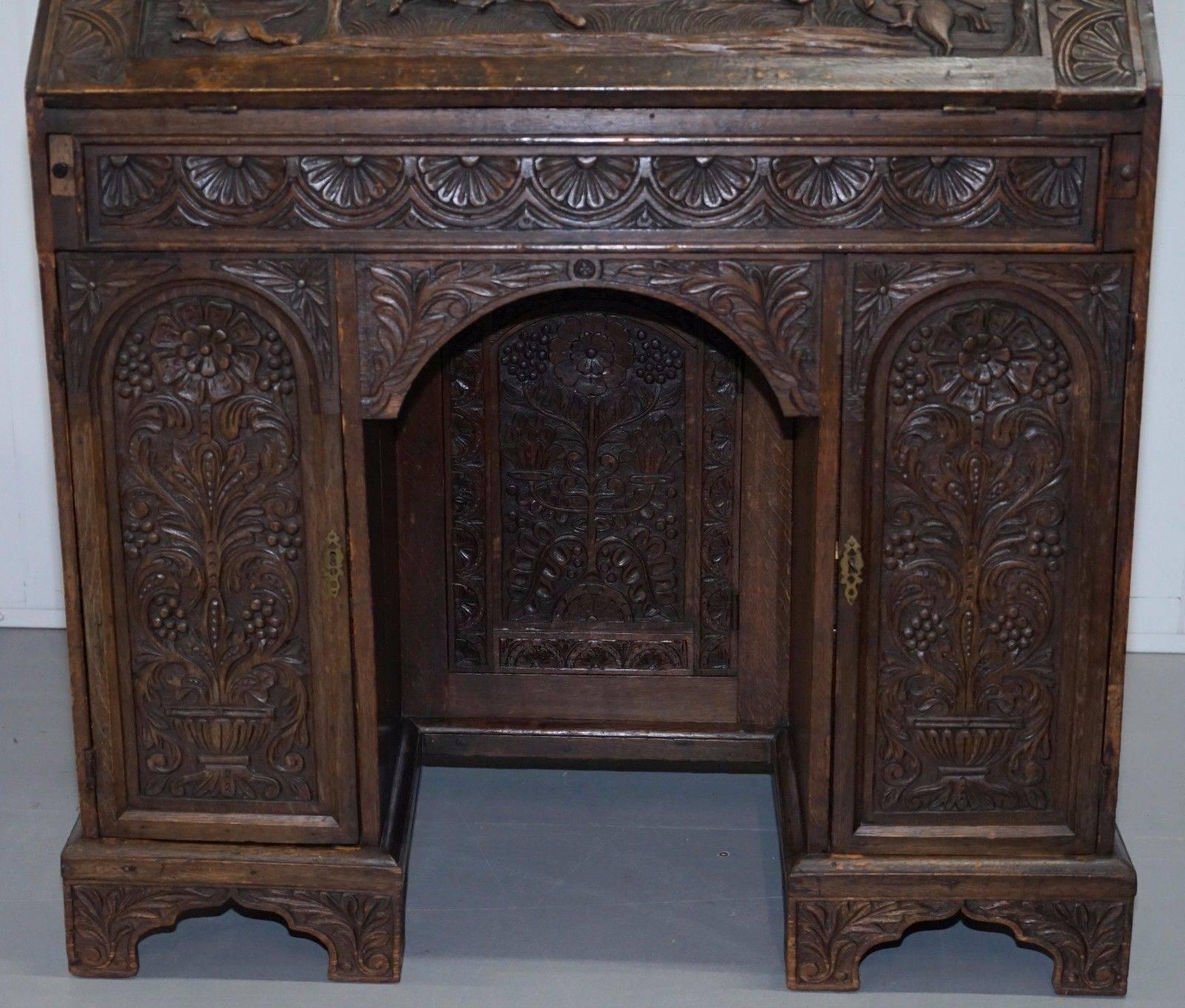 Late 17th Century Rare Charles II 1674 Carved with Hunting Scenes Writing Bureau Desk Lots Drawers
