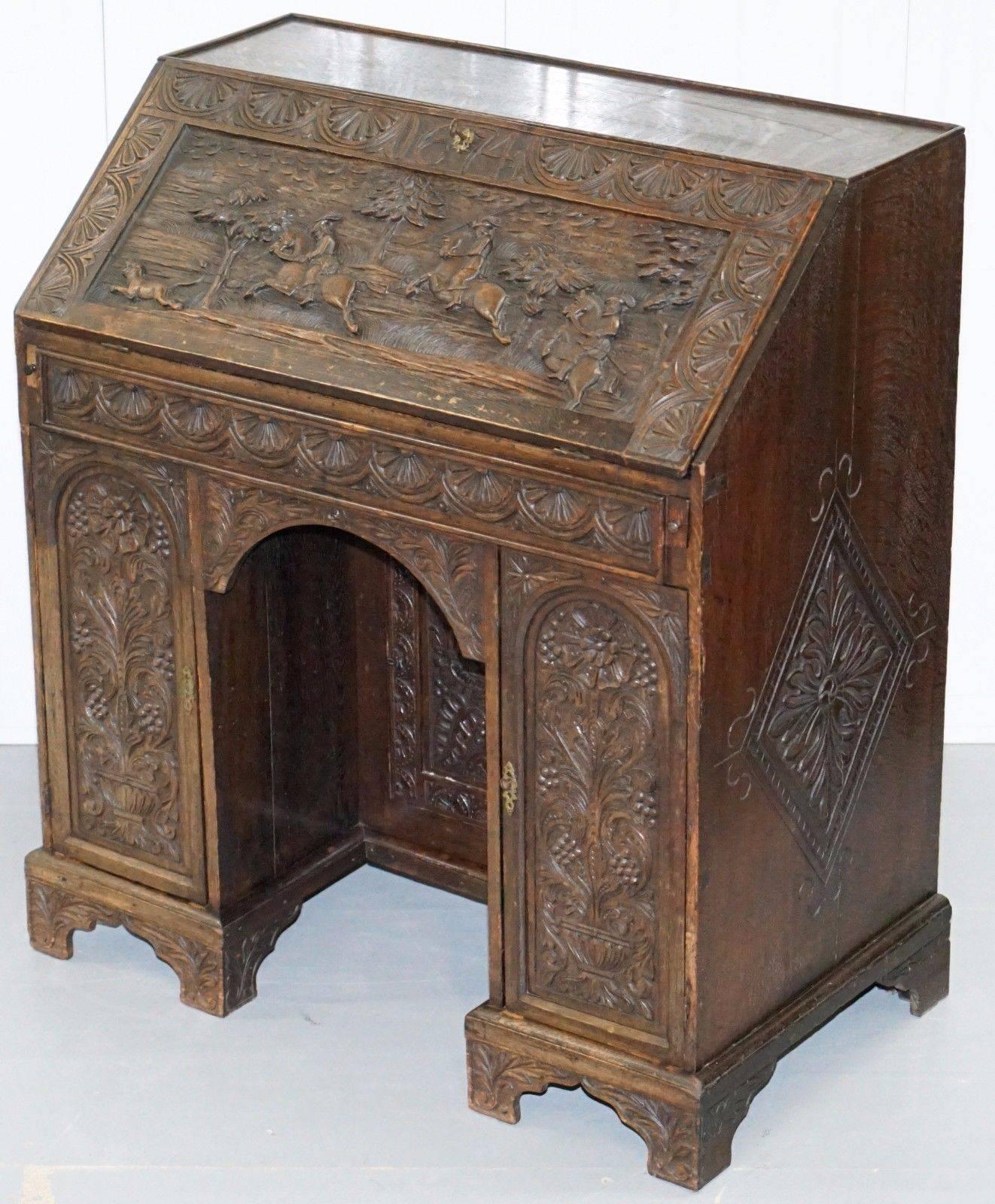 Jacobean Rare Charles II 1674 Carved with Hunting Scenes Writing Bureau Desk Lots Drawers