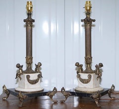 Pair of Antique French Bronze Corinthian Pillar, Cherubs Marble Base Table Lamps