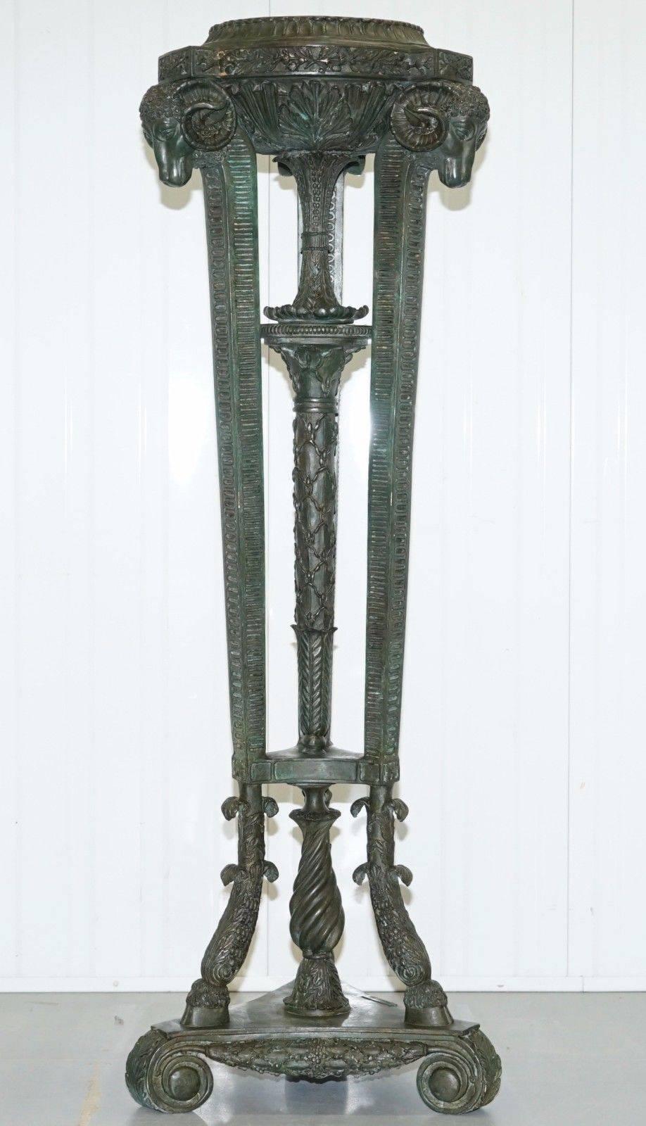 We are delighted to offer for sale this stunning very large and heavy bronze pillared stand with rams head detailing

This is one of the large bronze pieces I have ever seen, a really grange statement piece, the rams head casting seems well