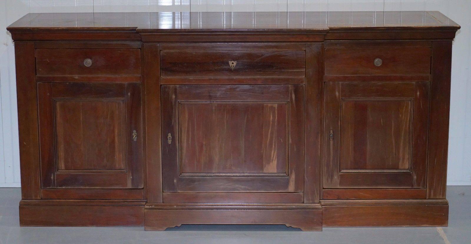 We are delighted to offer for sale this large distressed Grange France breakfront solid cherrywood sideboard RRP £3999

A large and substantial piece, as you can see its heavily distressed, personally I think it looks amazing but if you’re looking