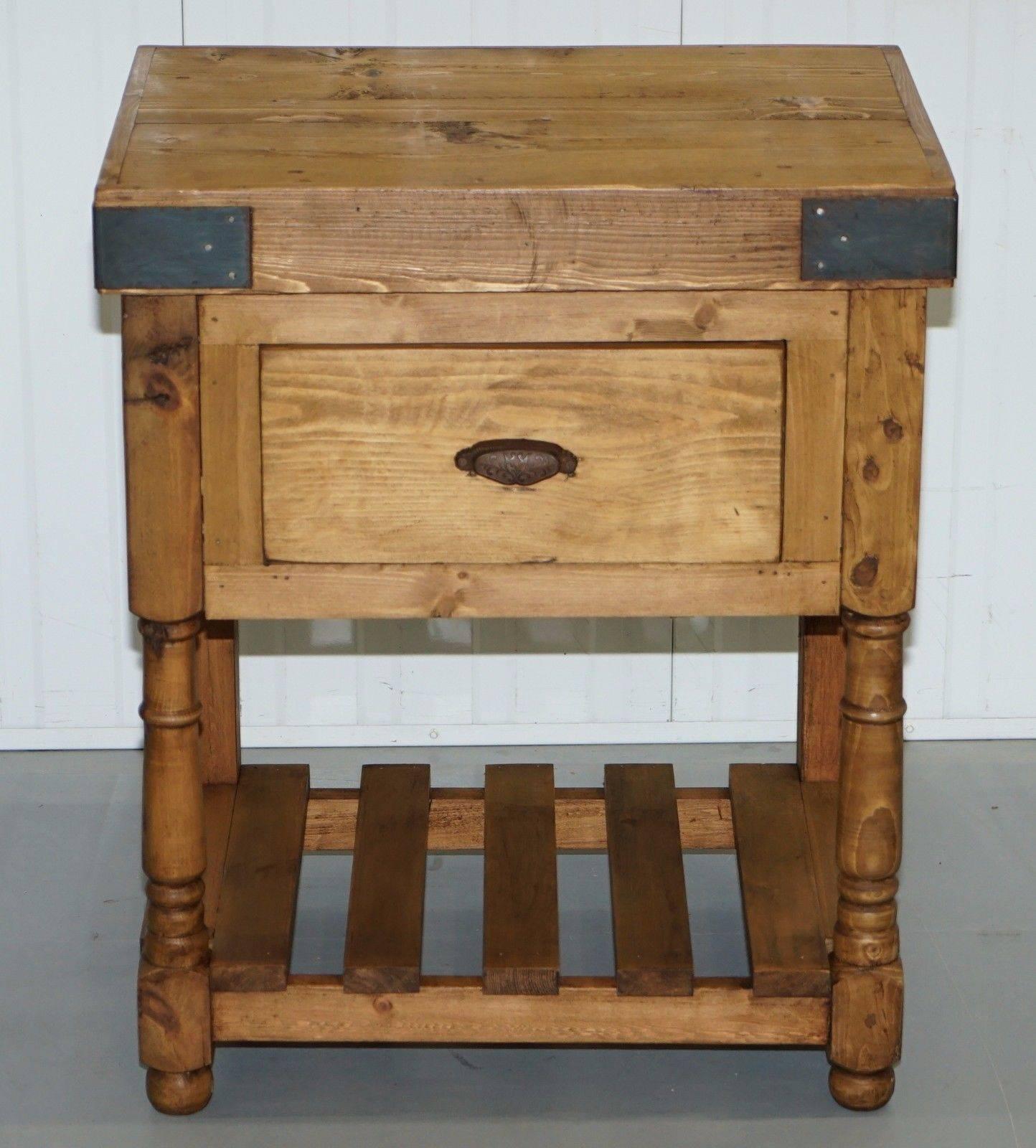 We are delighted to offer for sale this lovely solid oak kitchen island Butchers Block

A really decorative and helpful kitchen aid in excellent unused condition, the large central drawer is really quite huge and will happily store all your