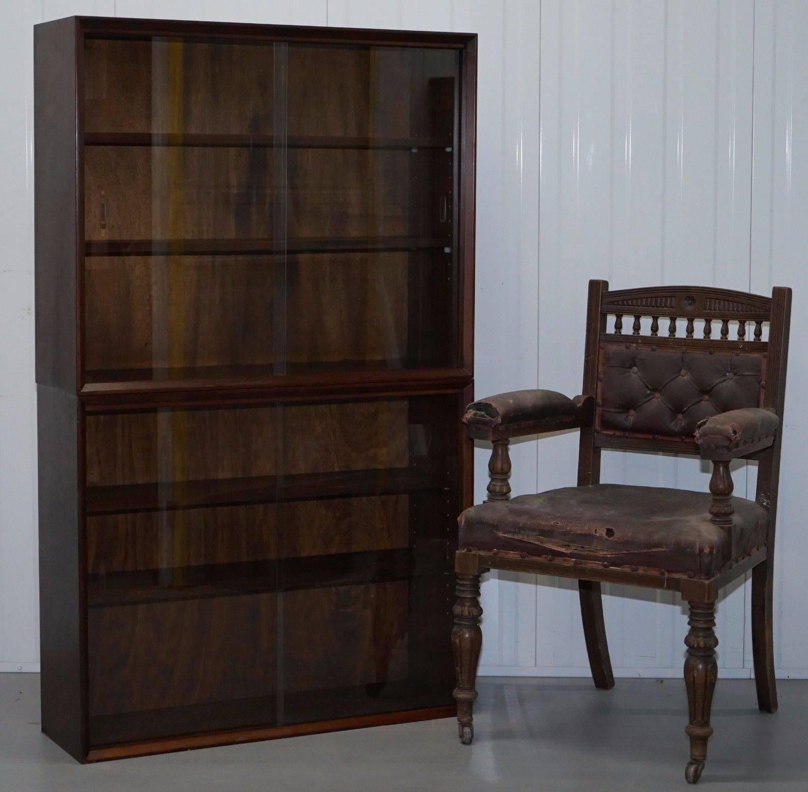 We are delighted to offer for sale this lovely pair of Herbert Gibbs Furniture solid mahogany with glass sliding doors display bookcases

A very functional pair in excellent condition, we have lightly cleaned hand condition waxed and hand polished