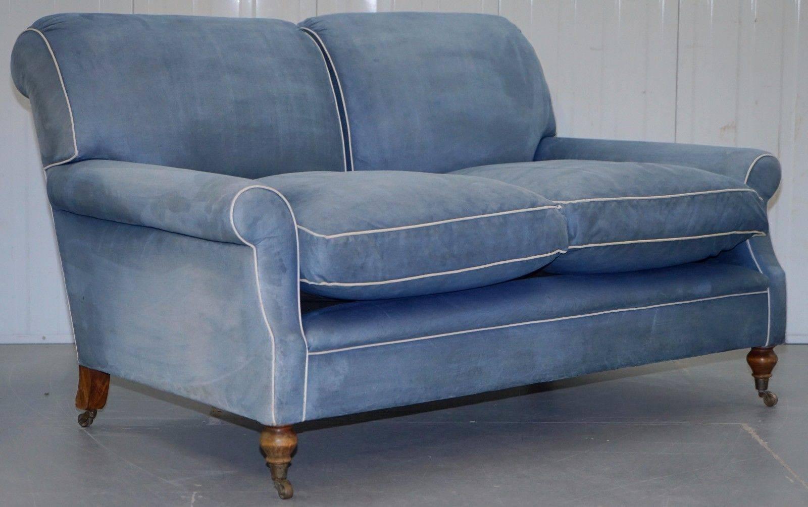 We are delighted to offer for sale this lovely RRP £10,046 George Smith Signature Laid back scroll arm two-seat sofa with feather filled cushions upholstered with premium blue suede upholstery 

This sofa has been fully and professionally