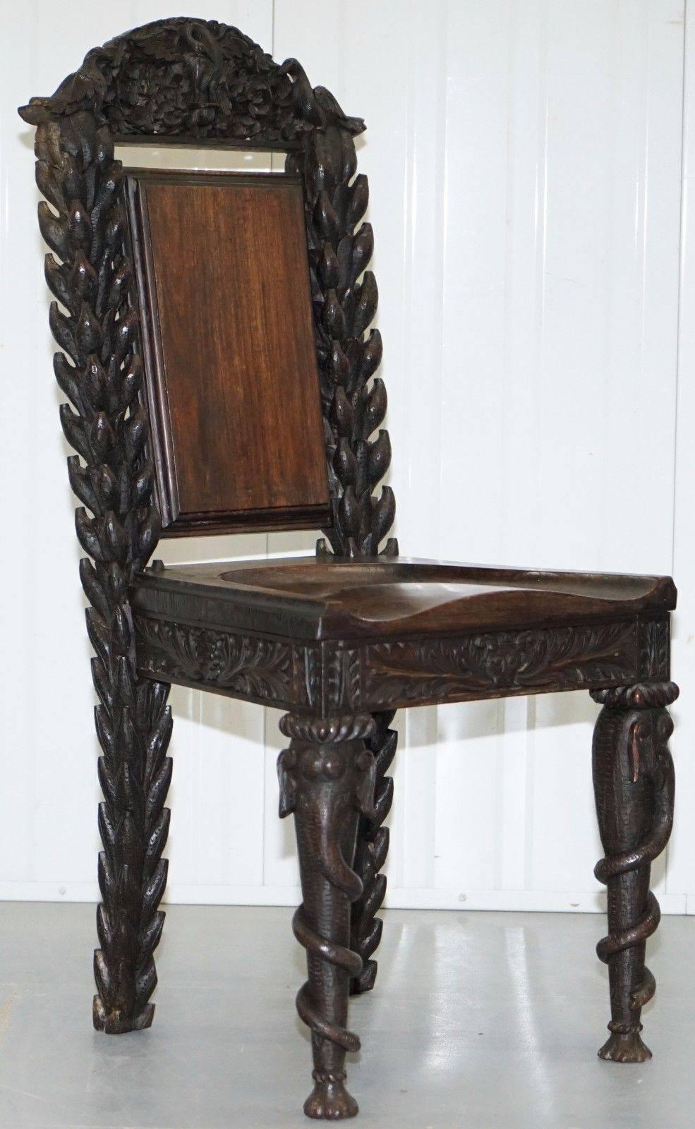 We are delighted to offer for sale this lovely pair of rare Anglo-Indian circa 1860 hand-carved occasional chairs with Elephant legs, floral and bird carvings

These chairs score a perfect 10/10 for intricate hand carving, they are the most