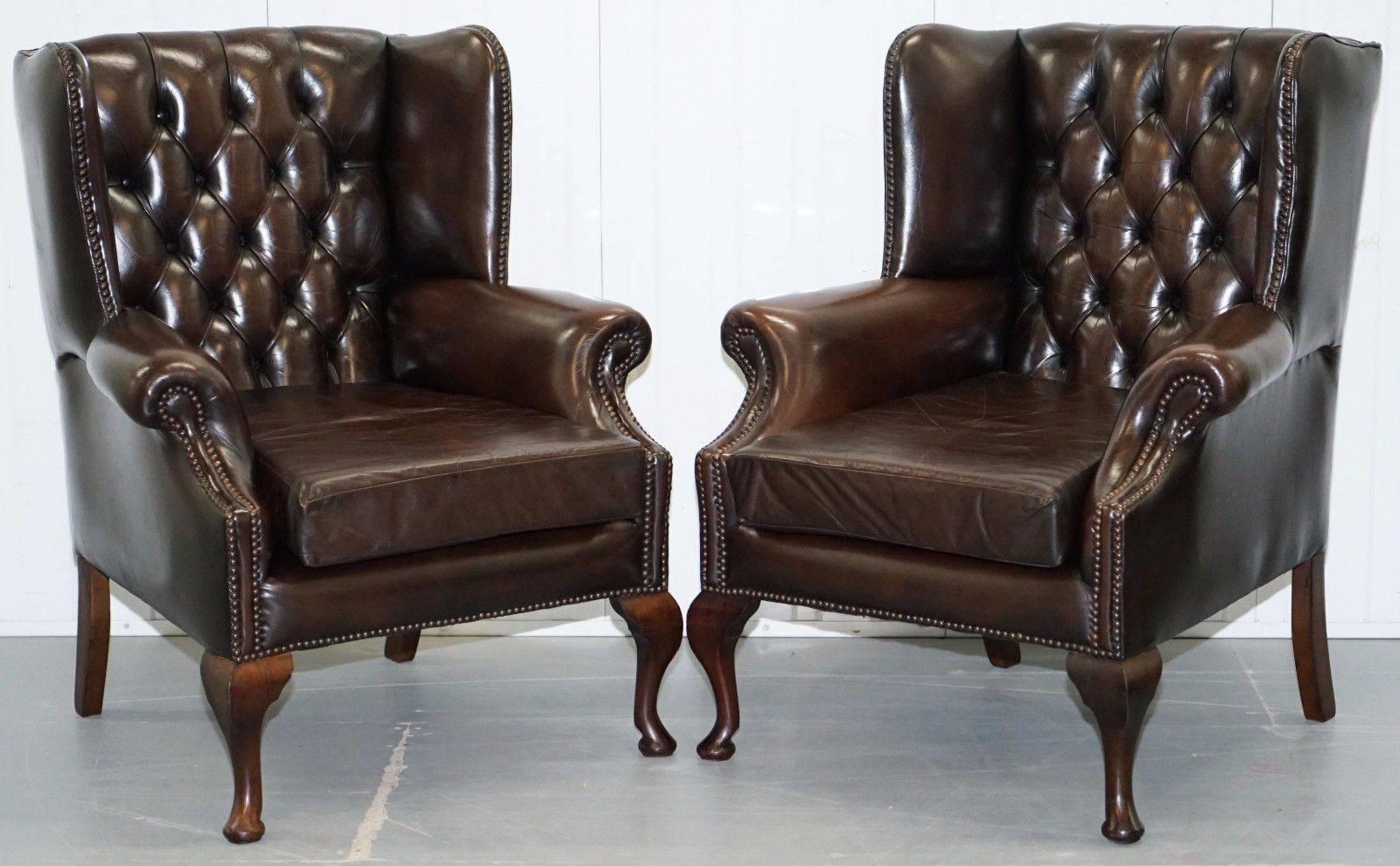 We are delighted to offer for sale this lovely pair of circa 1960, aged brown leather Chesterfield Wingback armchairs with matching ottoman footstool

A very good looking and comfortable pair in lightly restored condition throughout

These are