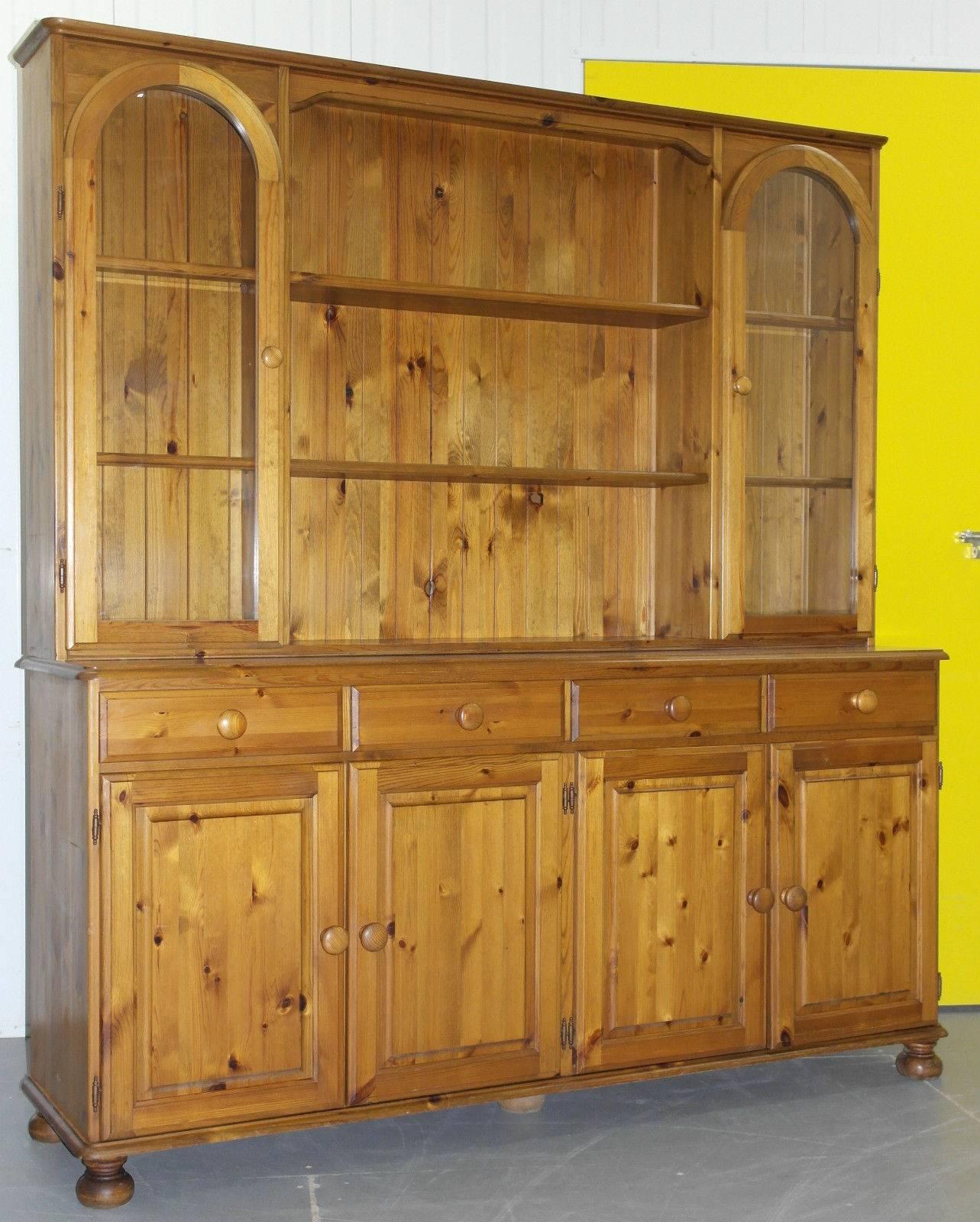 We are delighted to offer for sale this nice handmade in England Ducal Victoria solid pine welsh dresser

There are many models of these dressers this is one of the higher end pieces, the doors are very rare, they are half-moon finished at the top
