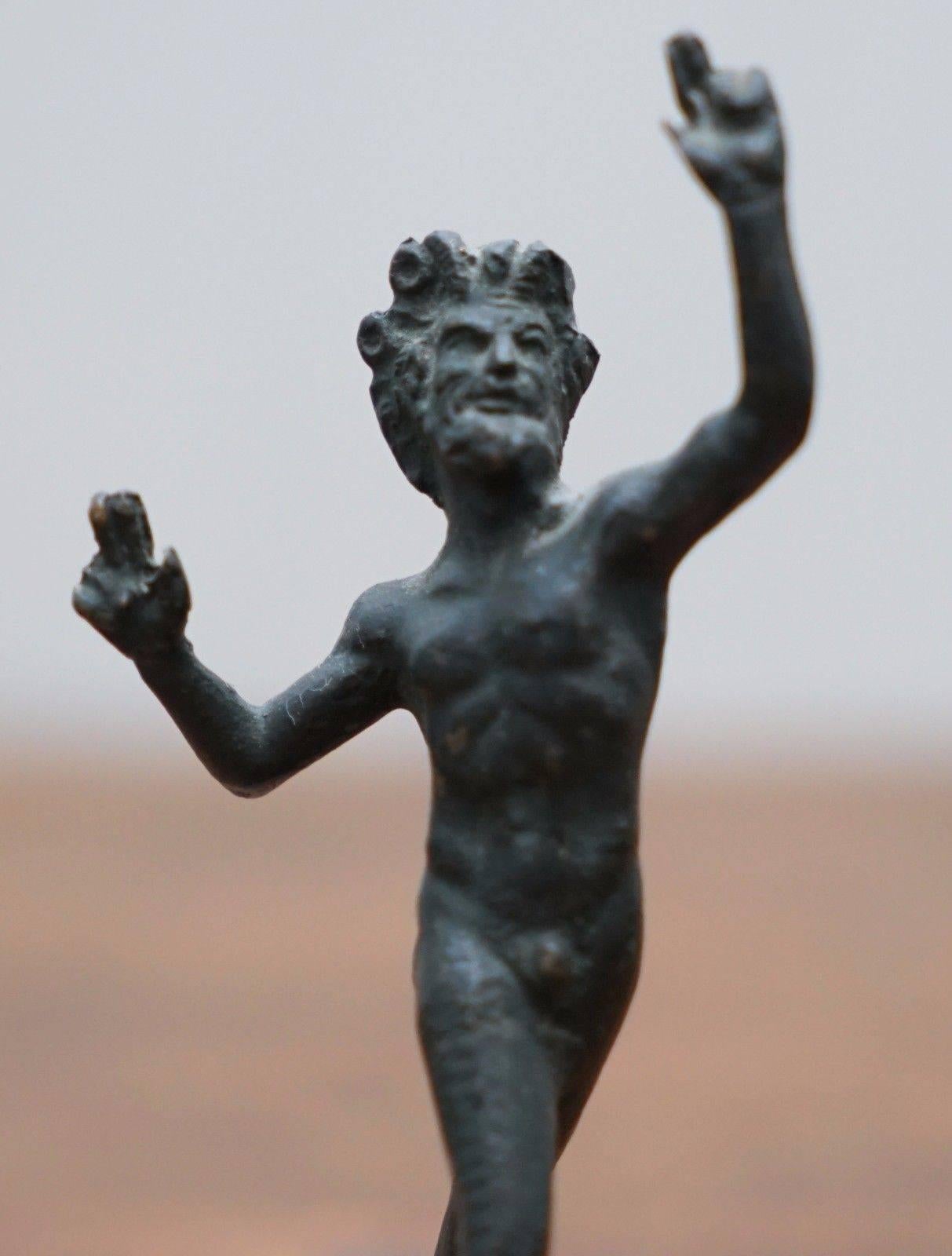 We are delighted to offer for auction this very early Grand Tour solid bronze miniature statue of The Dancing Faun

This piece is getting on for 200 years old, very naively cast but well observed

Dimensions:

Height:- 11.3cm

Width:-