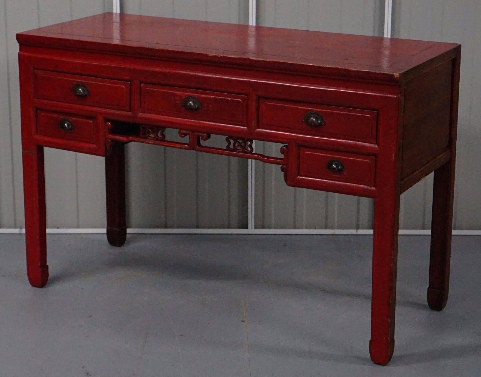 We are delighted to offer for sale this very nice Chinese vintage red lacquered Rosewood desk or dressing table

A very good looking and functional vintage piece that looks amazing from any angle

We have cleaned waxed and polished it, there is