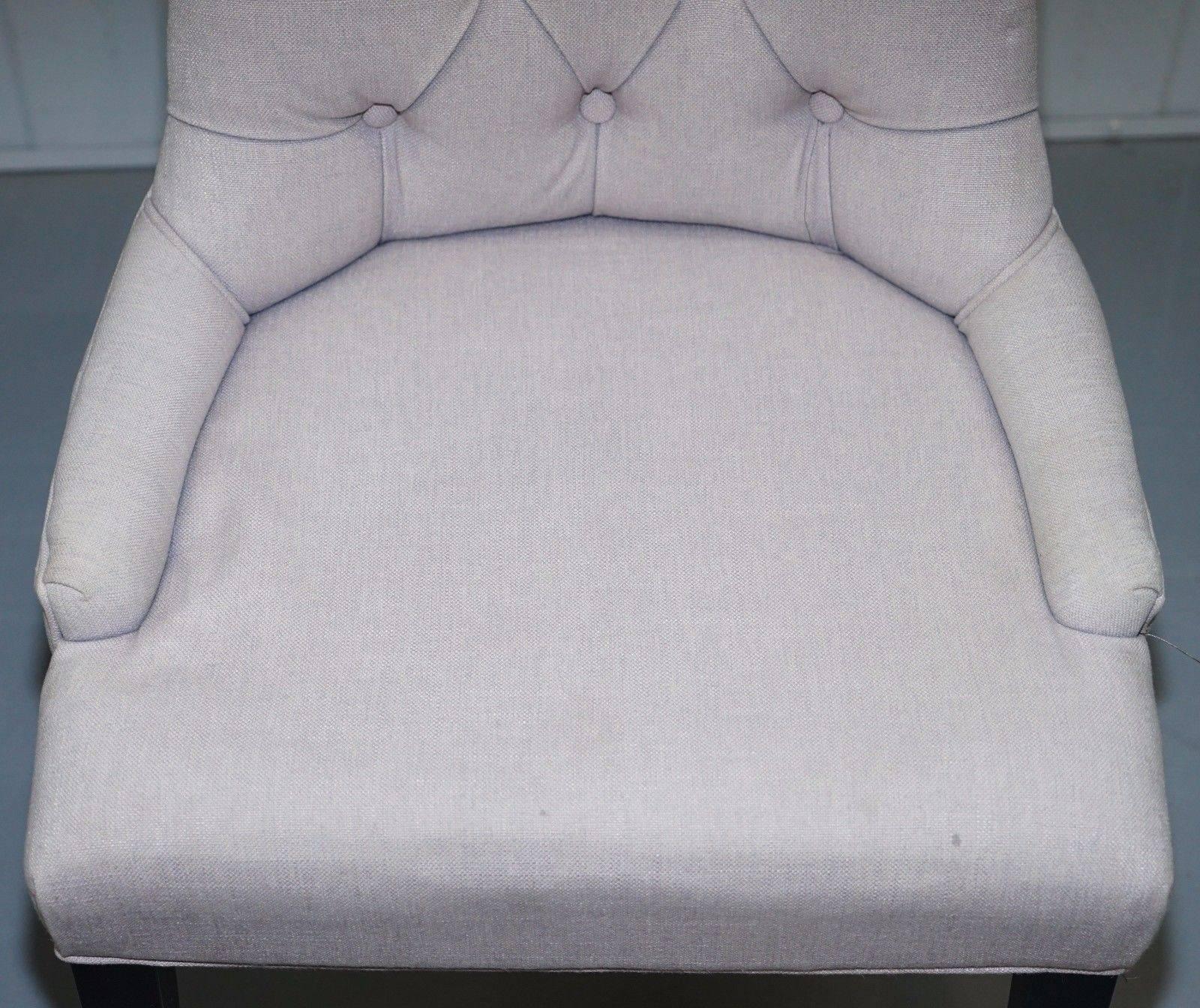 grey fabric chesterfield chair