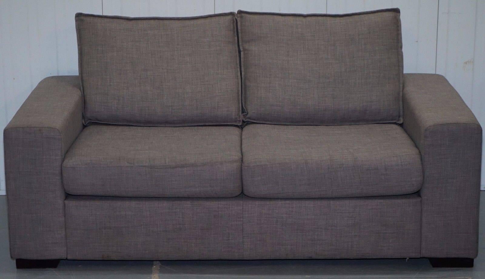 We are delighted to offer for sale this lovely Palomino grey shark tooth upholstery two-seat sofa

I’m unsure of the brand but everything else I purchased from this client was in the high thousands and every single piece was by a named known
