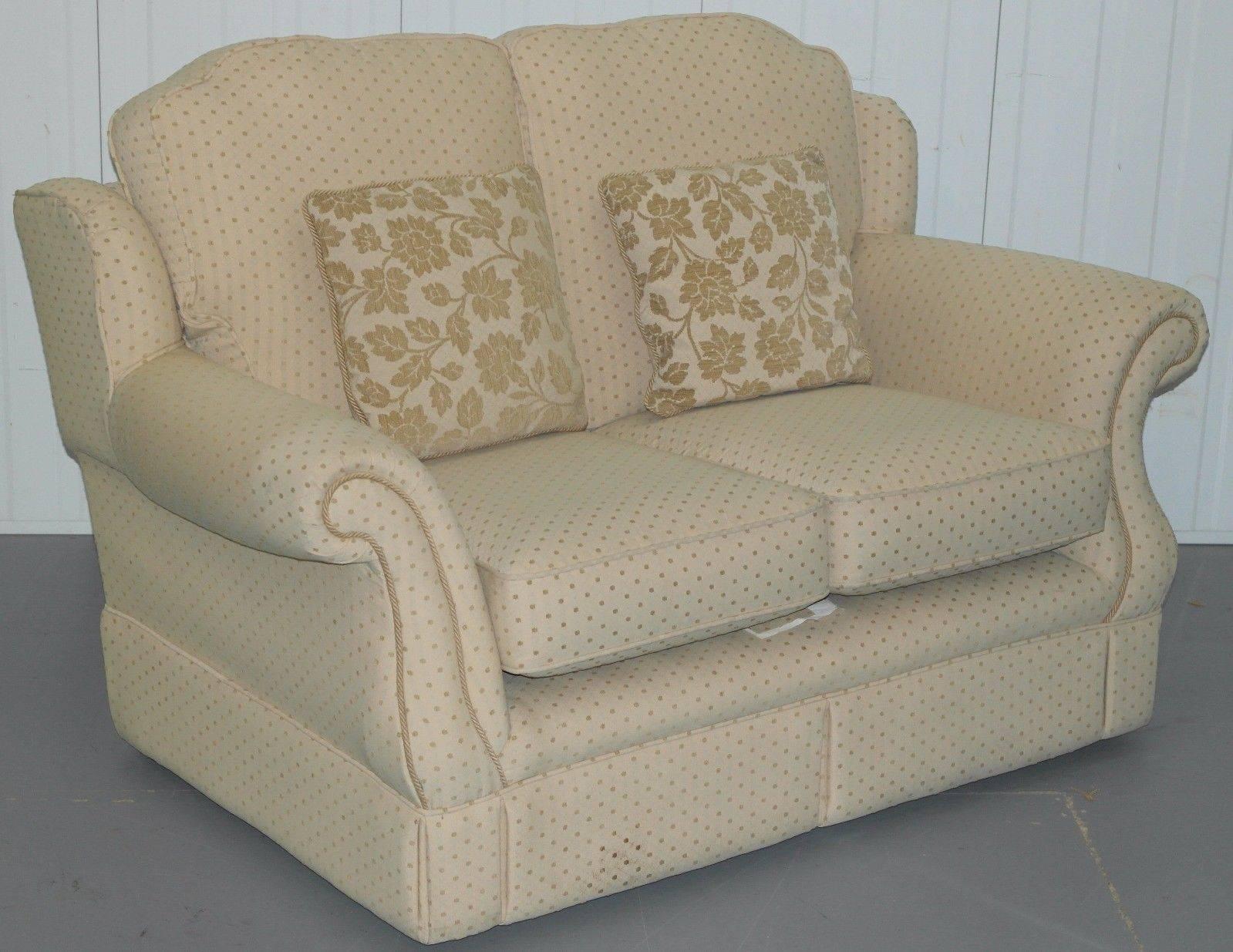 We are delighted to offer for sale this lovely little contemporary sofa and armchair suite

Both pieces are in good used condition and come with the original cushions and armchair covers which has sweet little tassels. The main body cushions are