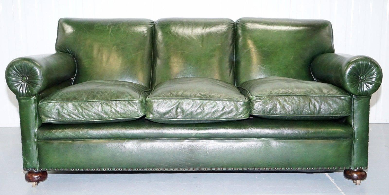 We are delighted to offer for sale this lovely Victorian Maple & Co “The Hever” aged green leather three seater club sofa with feather filled cushions

One of the best looking and most charming sofas I have ever seen, the cushions are lightly