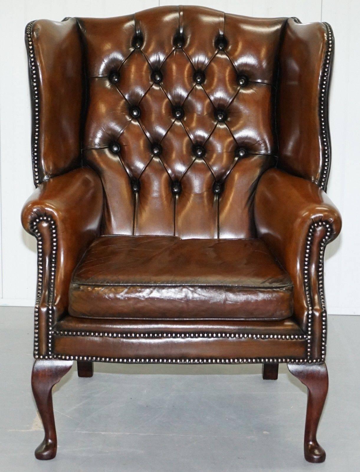We are delighted to offer for sale this very nice pair of fully restored hand dyed cigar brown leather Chesterfield wingback armchairs with matching footstool 

A very nice pair in excellent hand dyed order throughout, the leather patina is