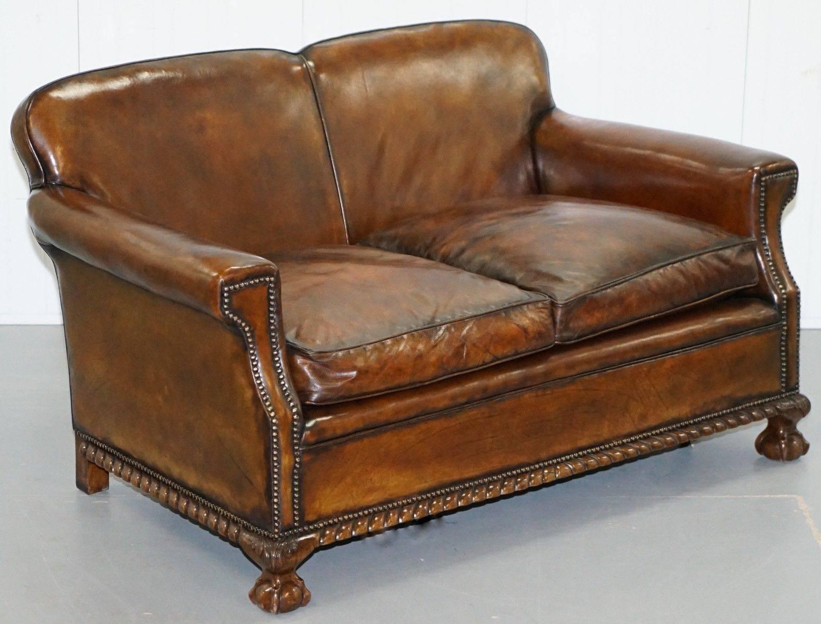 We are delighted to offer for sale this stunning original Victorian fully restored whisky brown leather sofa with coil sprung base feather filled cushions and claw and ball feet

I have included above a picture of the matching armchairs, they are