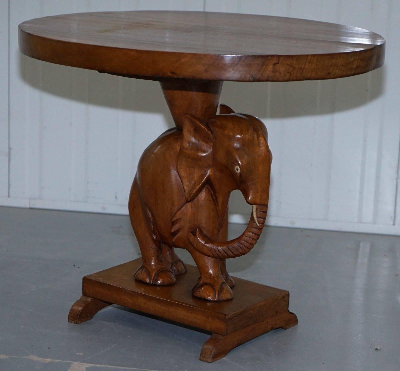 We are delighted to offer for sale this very nice handmade Chinese elephant solid teak occasional side table

A very good looking and well-made piece in lightly restored vintage condition, the table has wear on the top in the form of a timber