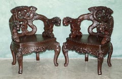 STUNNING CIRCA 1920 CHINESE EXPORT ORNATELY HAND CARVED DRAGON LOUNGE ARMCHAIRs