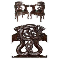 STUNNING CIRCA 1920 CHINESE EXPORT ORNATELY HAND CARVED DRAGON LOUNGE ARMCHAIRs