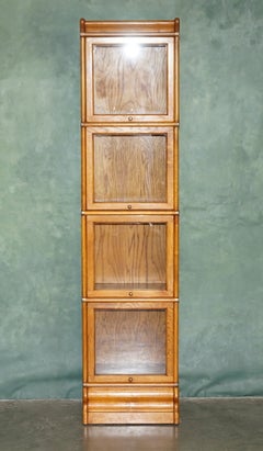 ANTIQUE MODULAR HONEY OAK & GILT BRASS STACKiNG BOOKCASE GLAZED RETRACTING DOORS