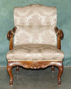 ANTIQUE FRENCH WALNUT ARMCHAIR WITH SILK DAMASK UPHOLSTERY CiRCA 1880 TO 1900