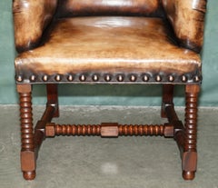 FINE PAIR OF ANTIQUE ITALIAN HAND DYED BROWN LEATHER RESTORED THRONE ARMCHAIRs