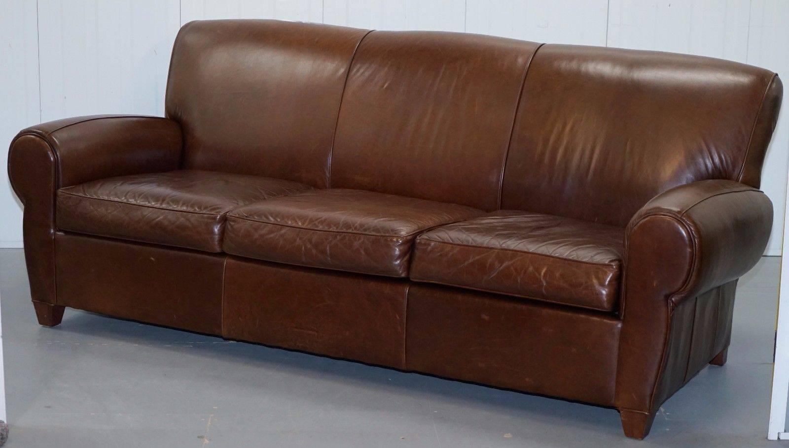 Modern Heritage Aged Brown Distressed Leather Four Seater Sofa and Ottoman