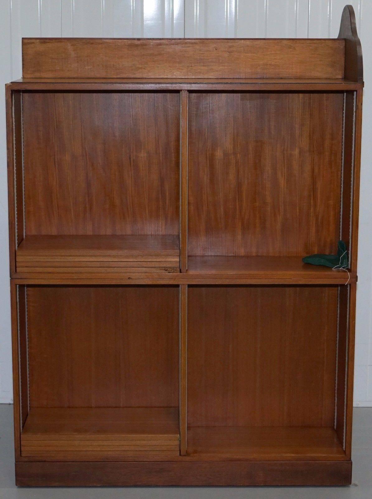 Hand-Carved Matching Pair of Mahogany Double Sided Bookcases on Wheels Great Room Dividers
