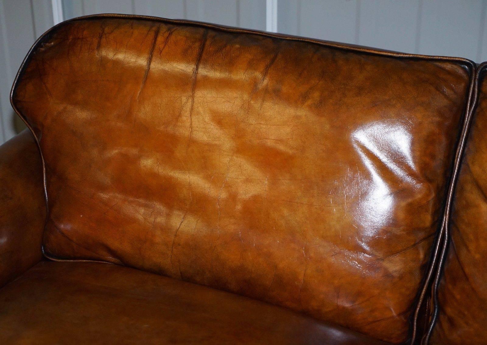 We are delighted to offer for sale this lovely original, circa 1910 Satinwood framed with claw and ball feet fully restored hand dyed whiskey brown leather sofa made by Elson LTD of Long Eaton

This suite is as rare as they come, the base frame is