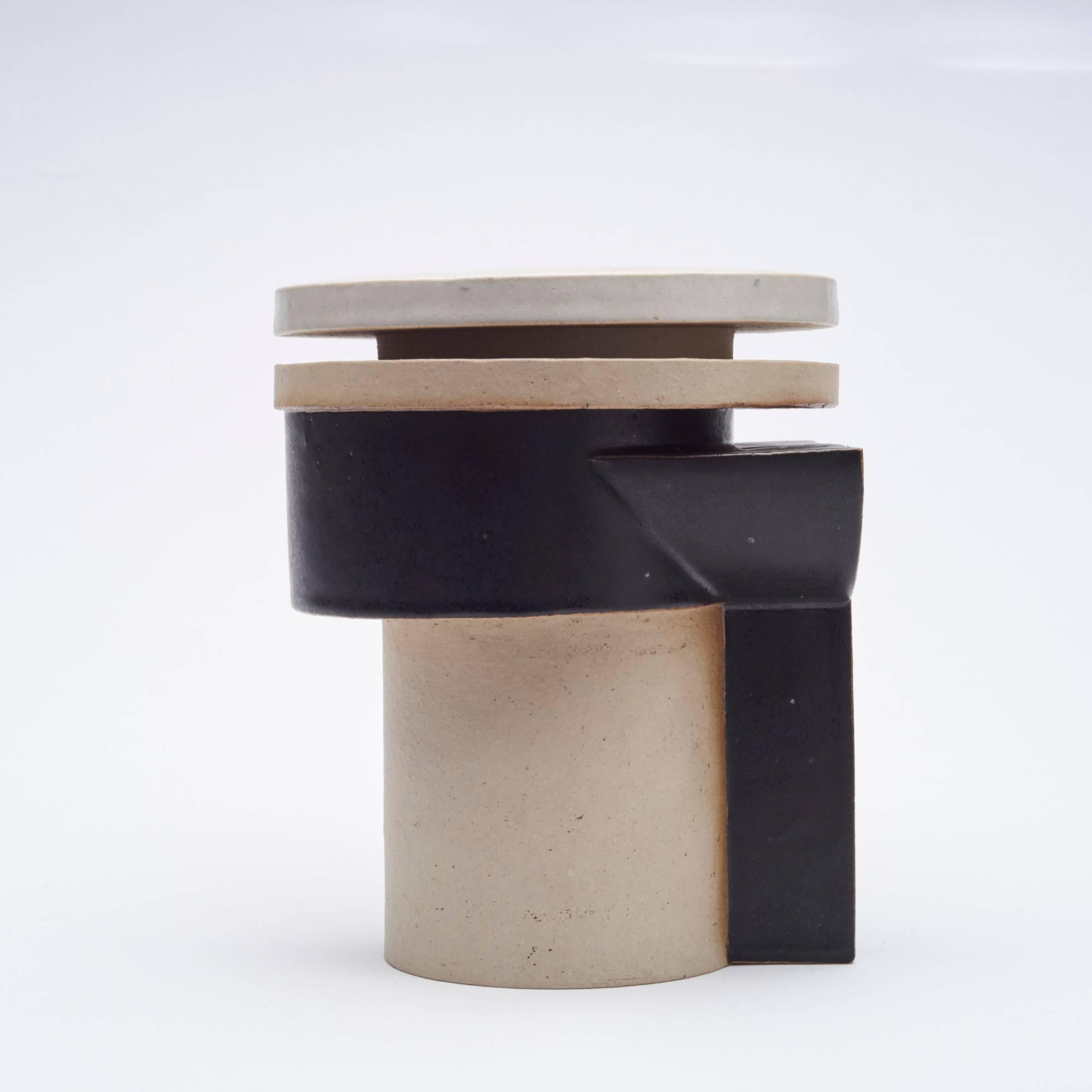 Fantastic sculpture made in 1977 by Fritz Vehring, built and mounted, matte cream and black glaze.