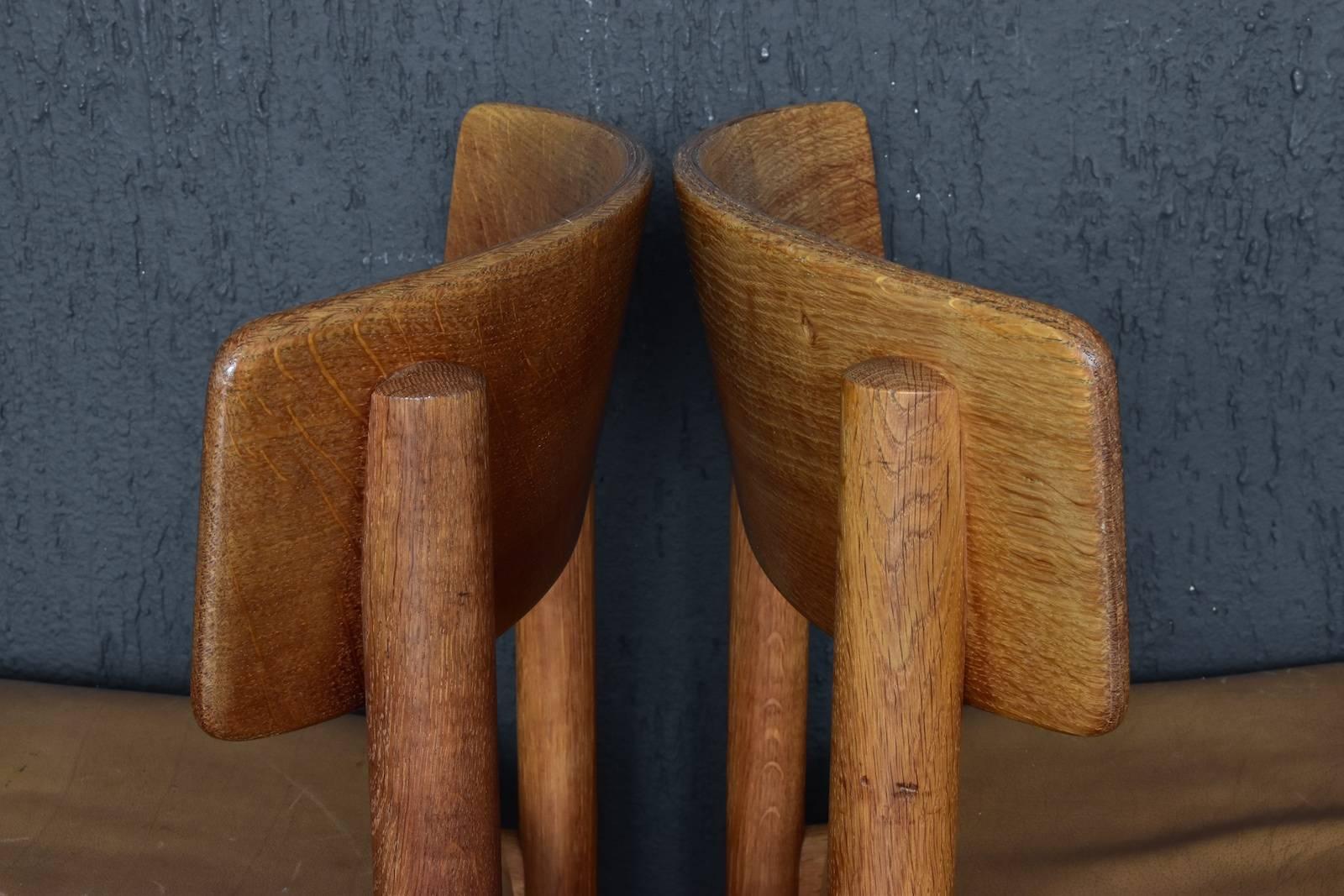 Set of four Børge Mogensen dining chairs in oak and light brown leather by Fredericia Stolefabrik, Denmark, 1950s.
